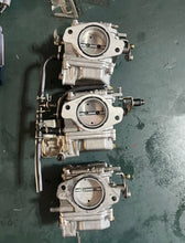 Load image into Gallery viewer, 90 75 hp Yamaha carburetor set 6H107 two stroke 1992-2003 without linkages 6H1-14302-07-00 6H1-14301-07-00 6H1-14303-07-00
